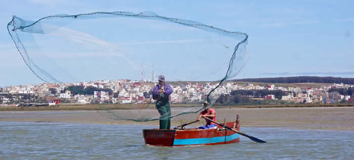 Fishing on a Moroccan wetland